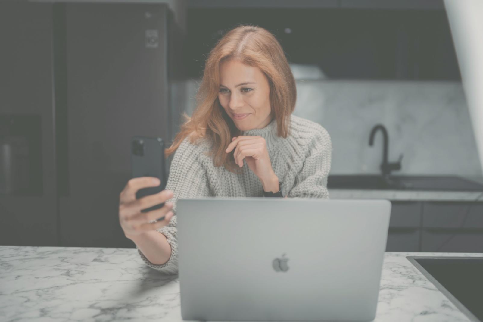 Financial analysts reviewing real-time market data on multiple screens in modern office environment